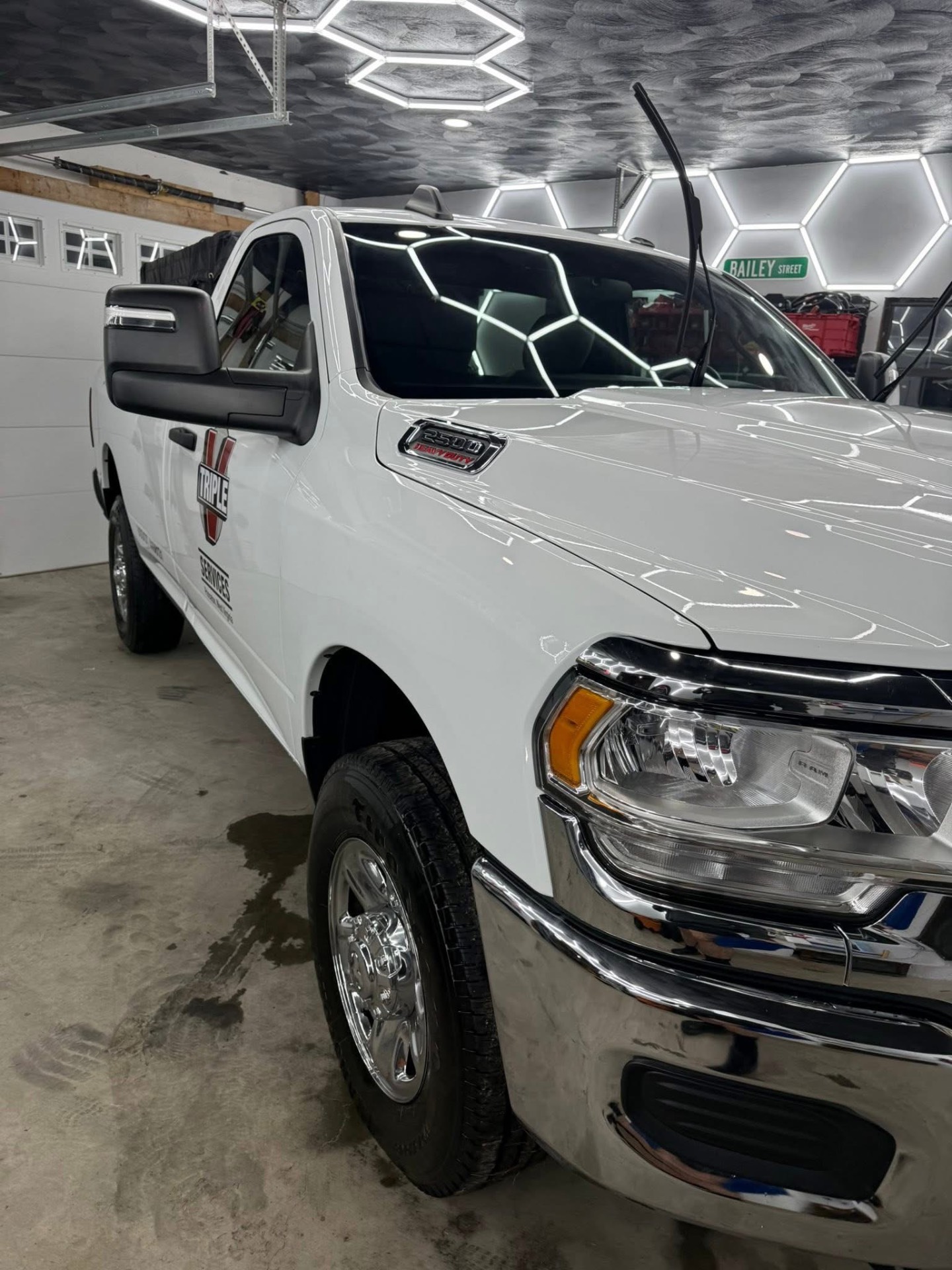 White Ram 2500 work truck with a clean, glossy finish